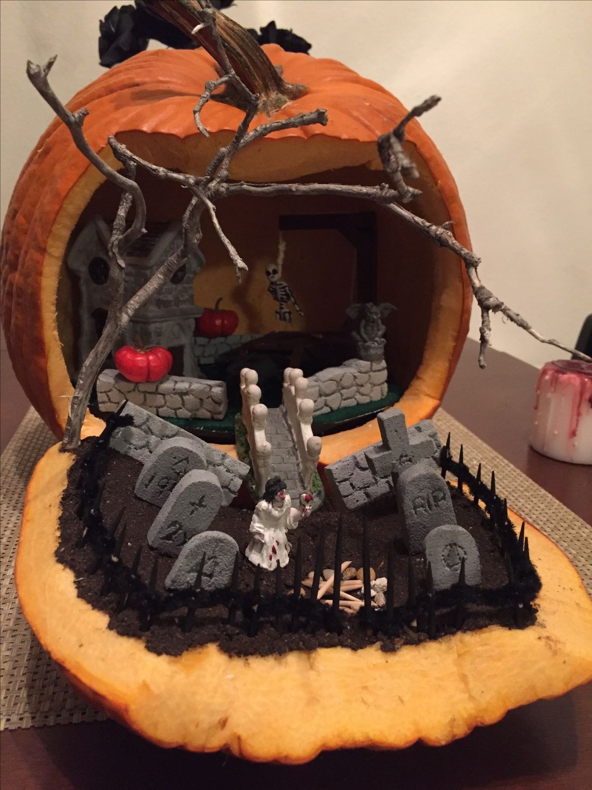 A tiny haunted house inside a pumpkin.
