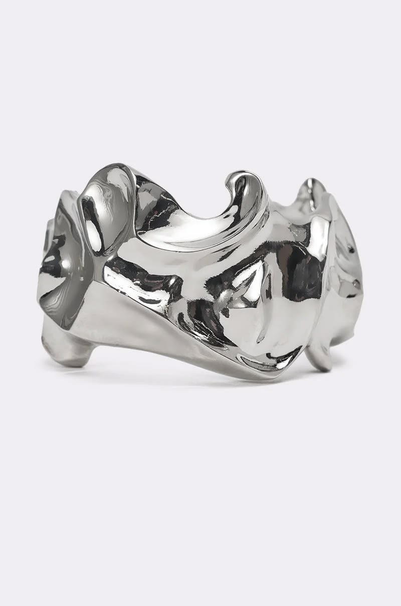 Sculptural rings. This shape in silver.