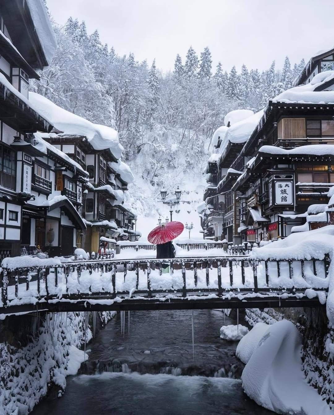 Ginzan Onsen, Japan. This town after dark, in the snow.