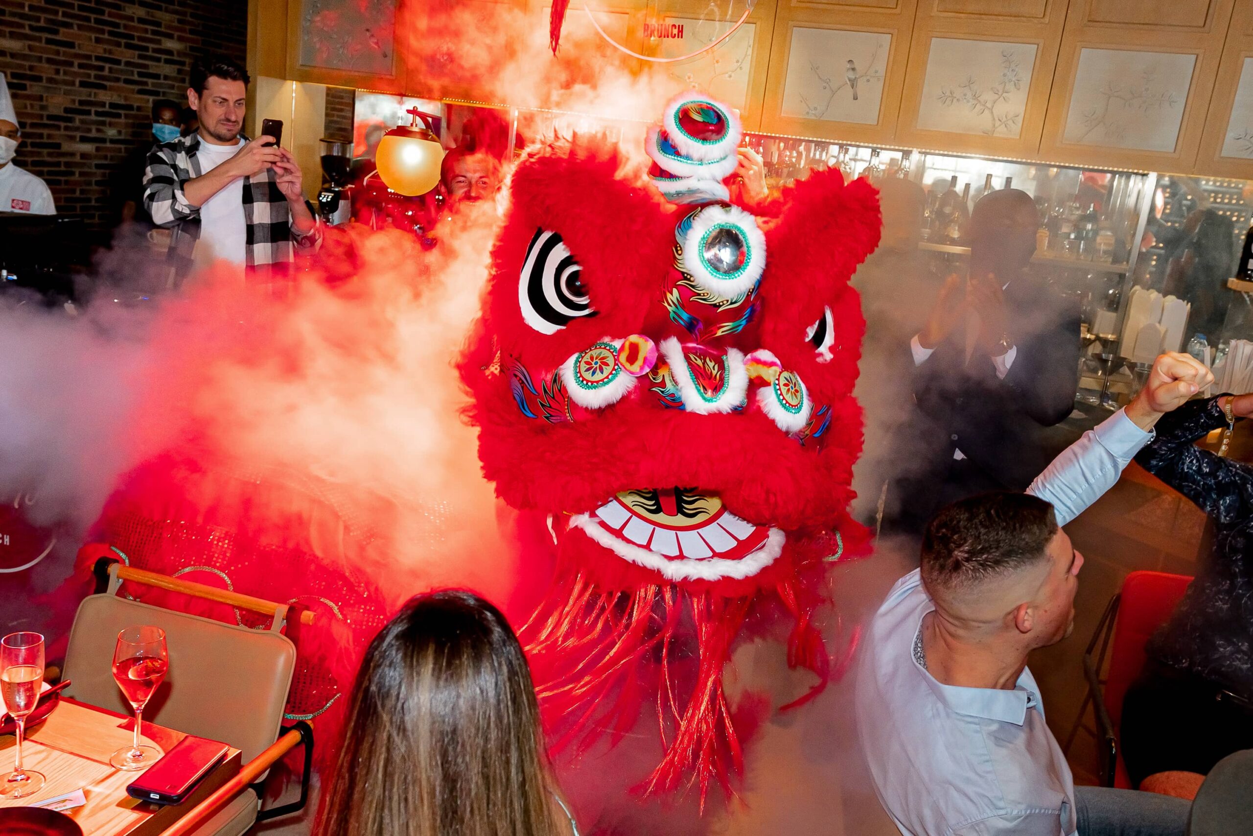 Chinese lion dance performance during Naughty Noodles Brunch at Maiden Shanghai